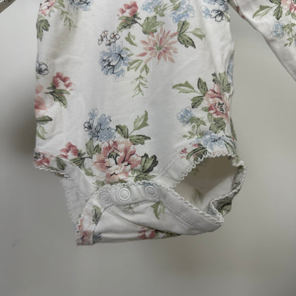Newbie kortermet body med blomster